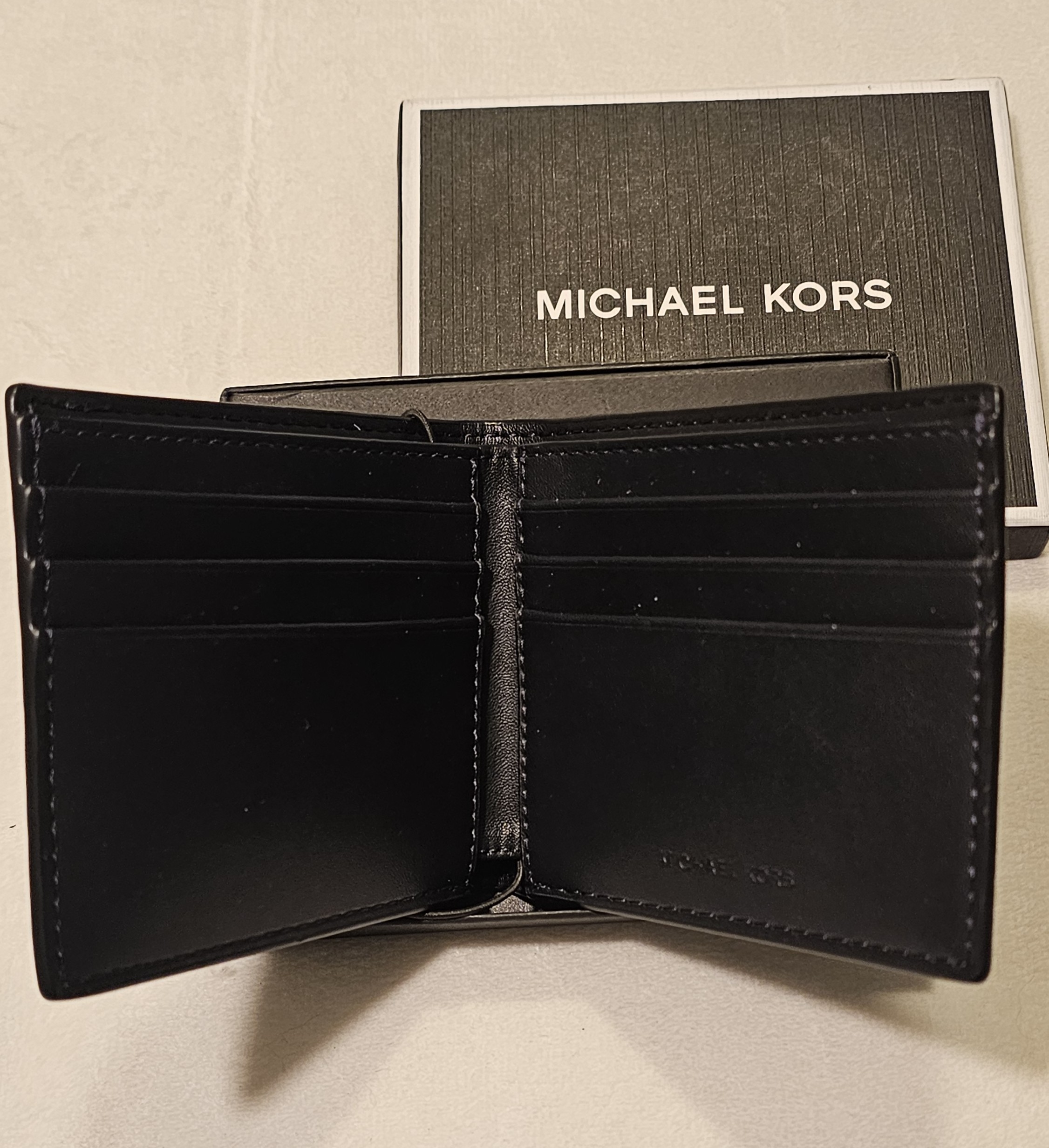 Cartera Michael Kors Slim Bifold azul